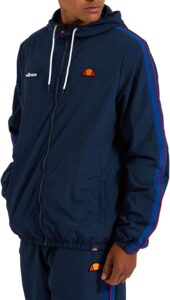 chaqueta cortavientos ellesse de hombre en color azul marino con raya roja